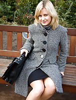 Hot blonde MILF Laurita strolls and flashes pussy on the city streets